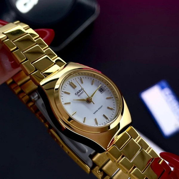 Жіночий класичний кварцовий годинник Casio LTP-1170N-7A із золотистим браслетом
