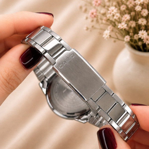 Жіночий годинник Casio LTP-1303D-4A з рожевим циферблатом