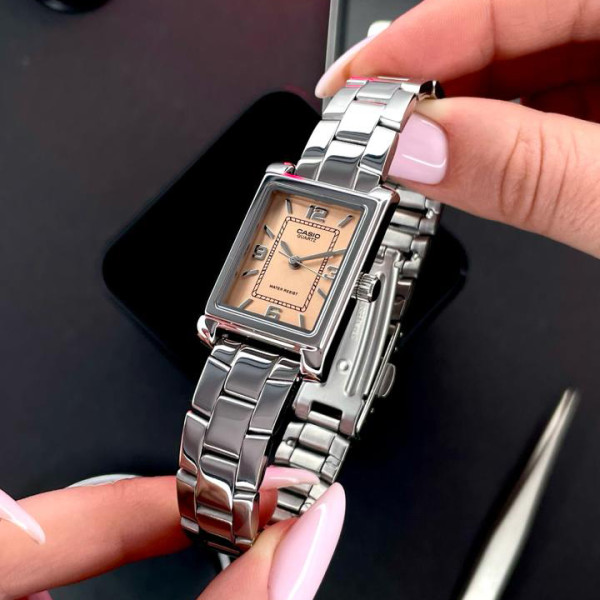 Женские часы Casio LTP-1234DD-4A кварцевые розовый циферблат