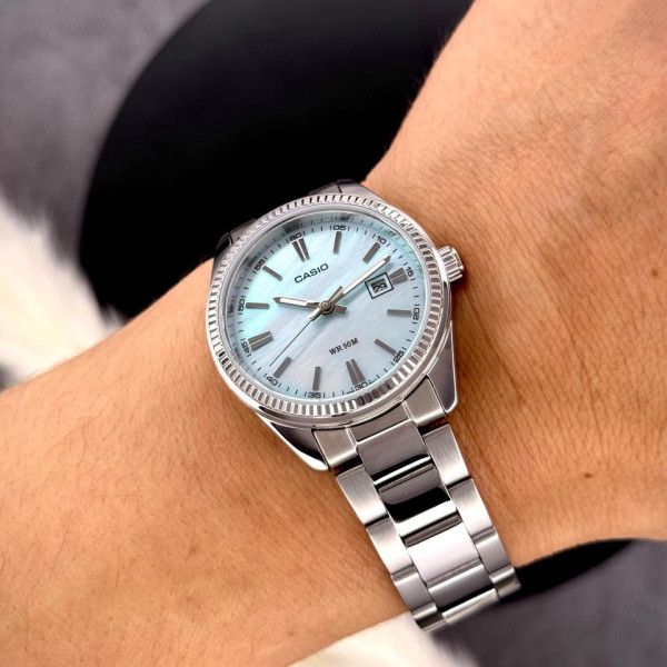 Женские наручные часы Casio LTP-1302DS-2A перламутровые с водозащитой 5 ATM