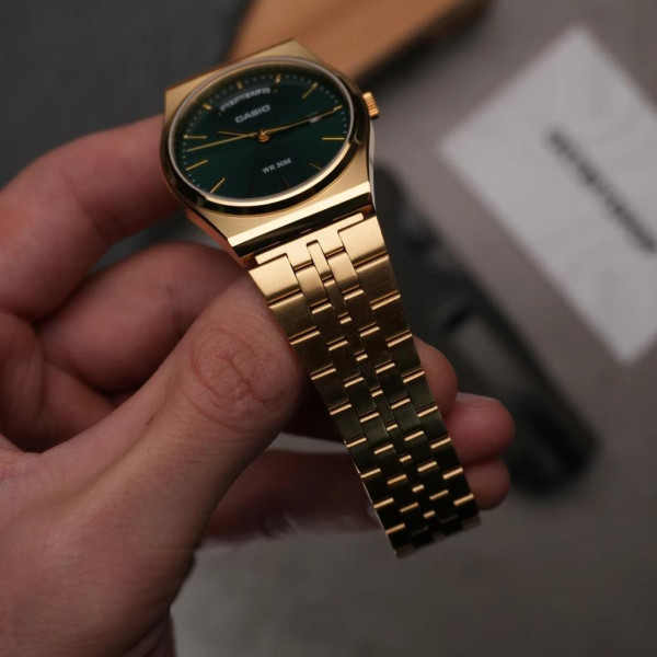 Чоловічий годинник Casio MTP-B146G-3A золотистий із зеленим циферблатом 5 ATM