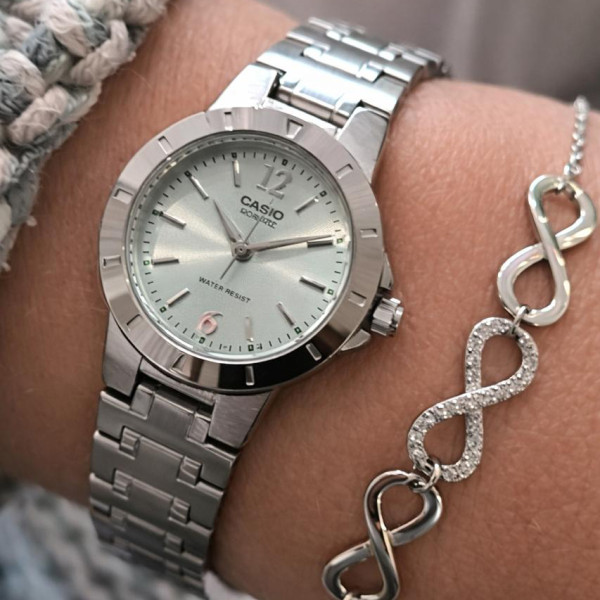 Жіночий годинник Casio LTP-1177A-3A з бірюзовим циферблатом та металевим браслетом