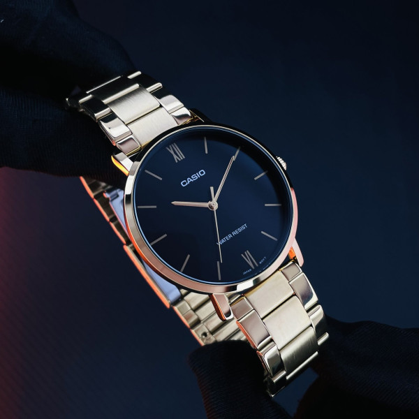 Чоловічий годинник Casio MTP-VT01G-1B кварцовий золотистий з чорним циферблатом